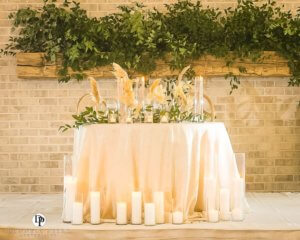 wedding sweetheart table with pampas grass