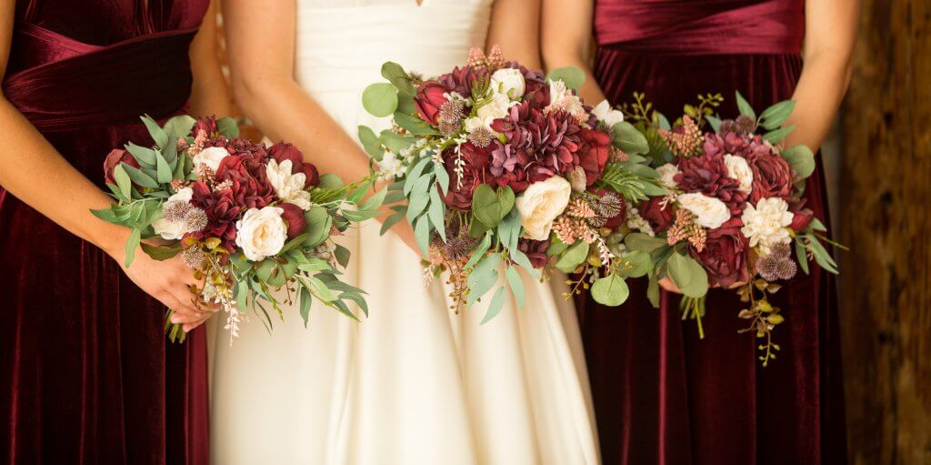 red and white winter wedding flowers